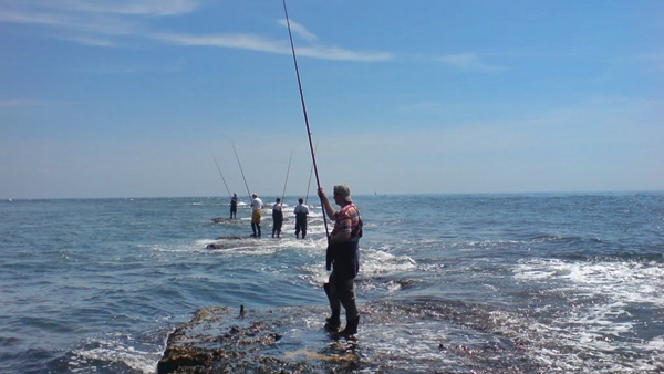 fishermen on Filey Brigg