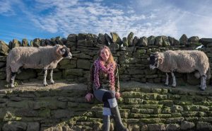 Amanda Owen, with sheep