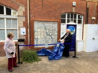 tiled map being unveiled